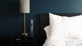 hotel bed and side table